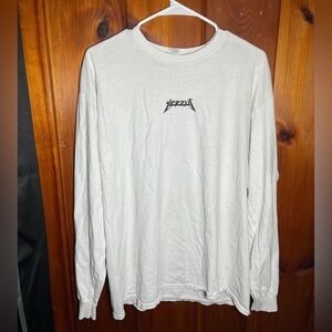 This white Yeezy shirt is in good condition! It is heavy cotton